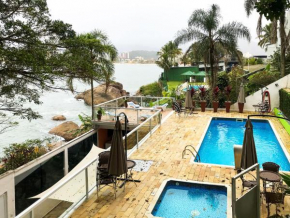 Apto a beira-mar com piscina em Martim de Sa SP